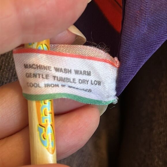 Vtg Transform dark purply blue polyester scarf with person in red outfit print - Picture 7 of 7